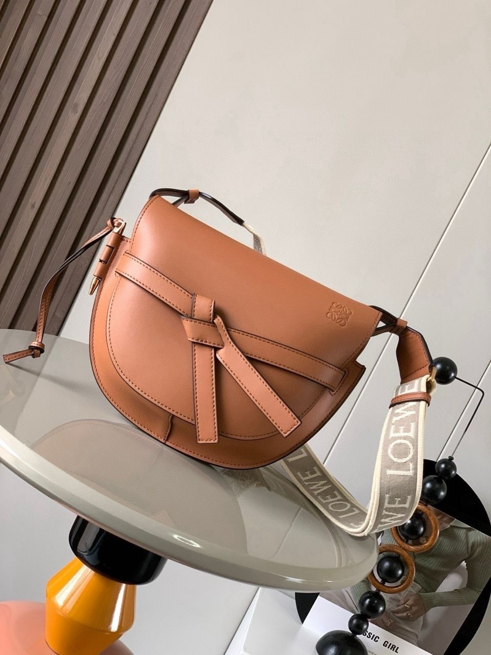 Tan Leather Saddle Crossbody with Branded Beige Strap